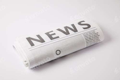Preview: one daily newspaper lying on white background