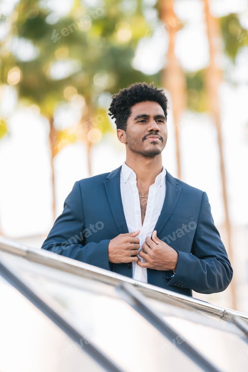 Preview: Serious ethnic man in formal suit