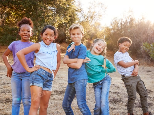 Preview: Portrait Of Multi-Cultural Children Posing And Hanging Out With Friends In Countryside Together