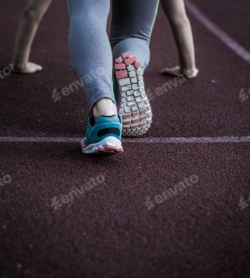 Preview: sports girl on the treadmill ready to run, close-up