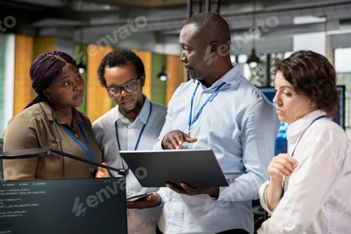 Preview: Team of programmers developing software applications