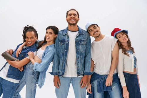 Preview: cheerful multiethnic friends posing near african american man standing with closed eyes on grey