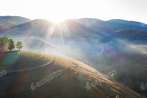 Preview: Drone view of beautiful summer sunrise over Transylvanian mountains.