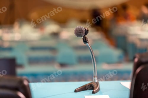 Preview: Microphone in concert hall or conference room soft and blur style for background.