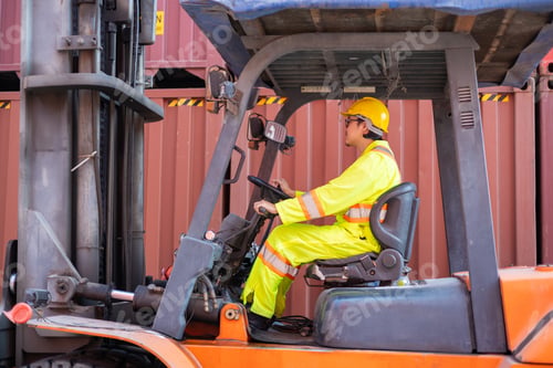 Preview: Engineer loads goods by forklift to stack containers