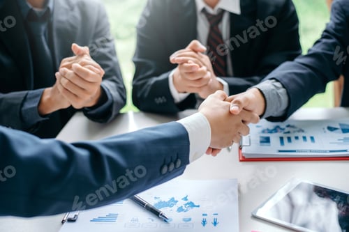 Preview: Businessman shaking hands agreement confirmed in the investment business.