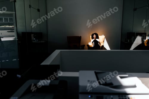 Preview: Young woman having a break in office