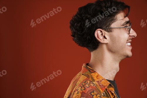 Preview: Smiling young hipster teenager with large glasses