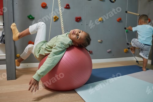 Preview: Girl Playing in Home Gym