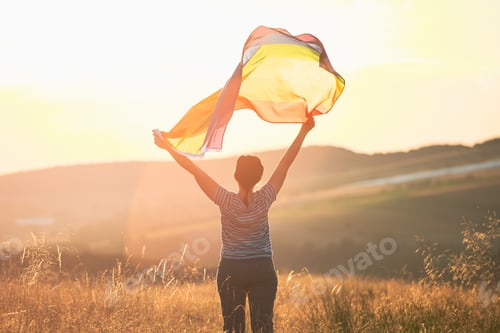 Preview: Young woman with LGBT flag.