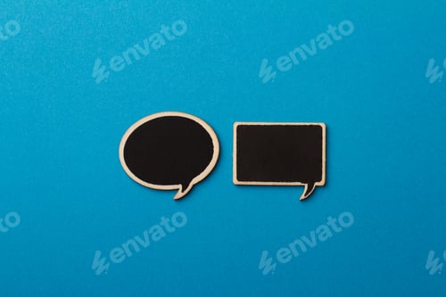 Preview: square and round charcoal speech bubbles on blue