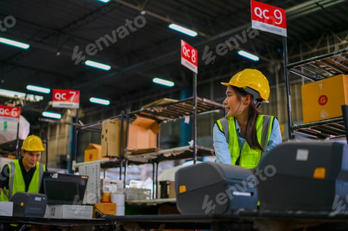 Preview: Blue collar workers are working at warehouse.
