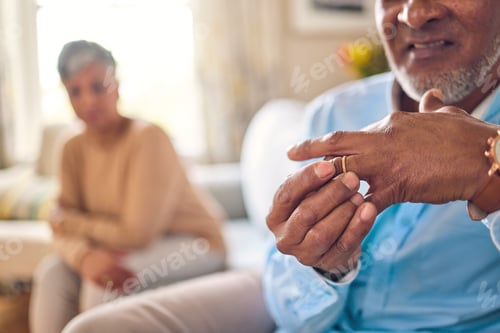 Preview: Senior man, hands and ring in divorce, fight or conflict from disagreement or argument on sofa at h