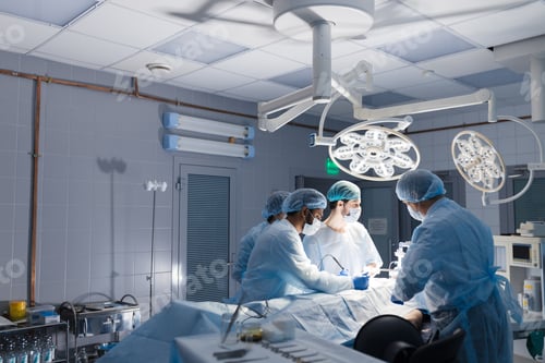 Preview: Team of Surgeons Operating in the Hospital