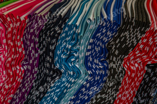 Preview: Closeup shot of colorful fabric pieces with various patterns arranged next to each other