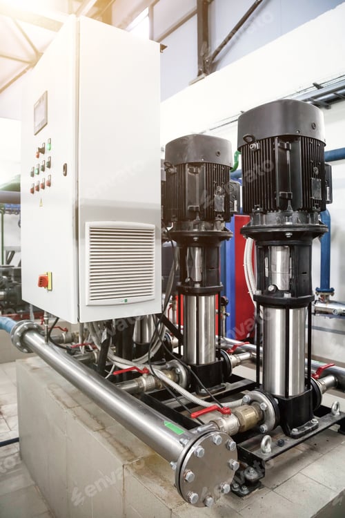 Preview: Industry pumps in an technical room. Industrial interior of water pump, valves, pressure gauges