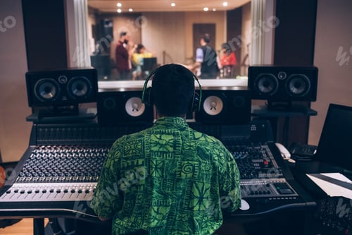 Preview: Sound engineer working in recording studio