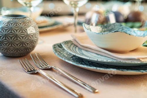 Preview: Beautiful elegant table setting with green stylish dishware and silver cutlery