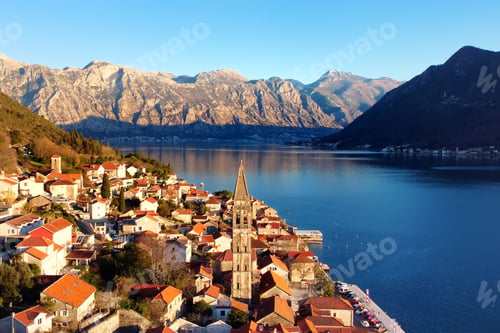 Preview: Breathtaking panoramic sunset aerial drone view of the ancient city of Perast, Montenegro.