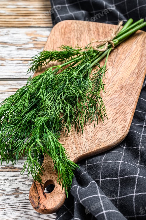 Preview: Organic dill. A bunch of fresh herbs. White background. Top view