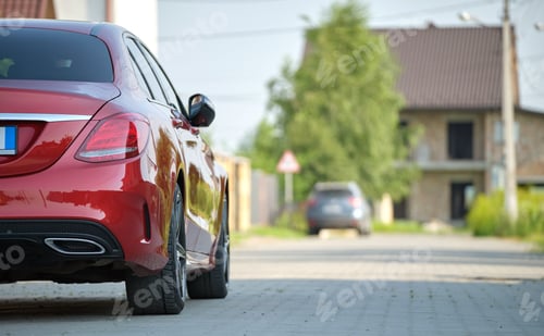 Preview: Cars parked in line on city street side. Urban traffic concept