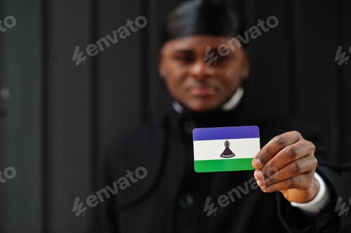 Preview: Young african man hold flag