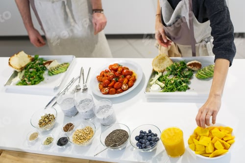 Preview: preparing healthy vegetarian breakfast for friends on light kitchen
