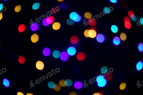 Preview: Abstract bokeh lights on dark background than can also be used as overlay.