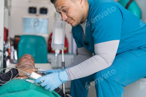 Preview: Doctor checking a patient's pulse in an ambulance
