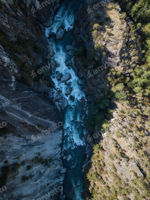 Preview: Aerial View of River flowing in canyon. Nature Background