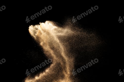 Preview: Sand flying explosion isolated on black background ,throwing freeze stop motion object design.