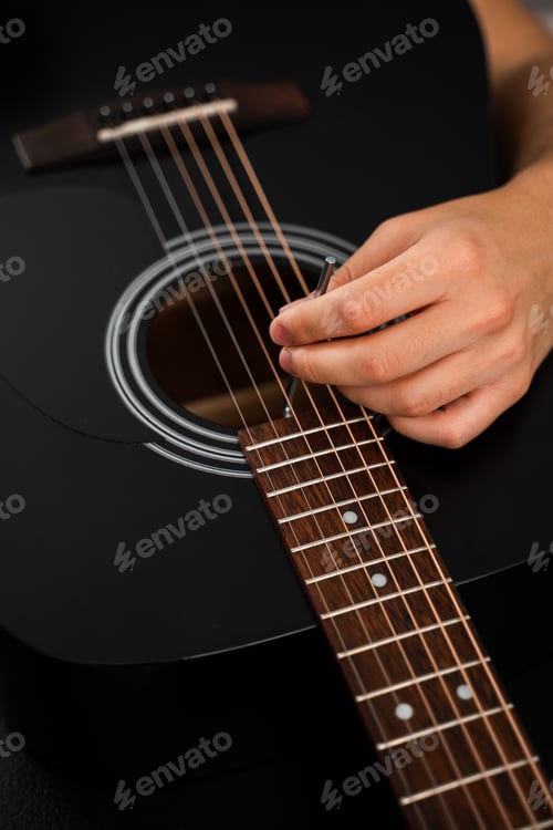 Preview: Setting neck relief on acoustic guitar using Allen key
