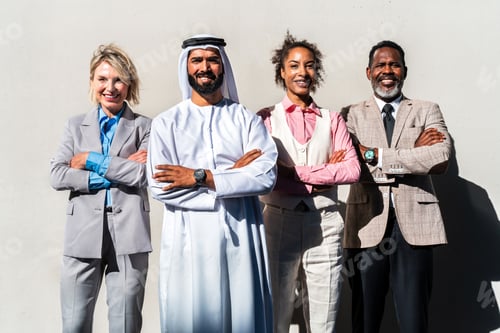 Preview: Group of multiethnic business people meeting an emirati businessman