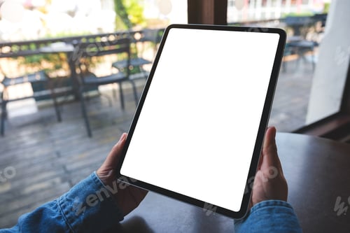 Preview: Mockup image of a woman holding digital tablet with blank white desktop screen