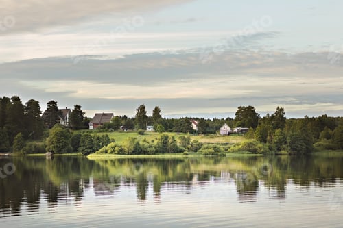 Preview: Village on the lake. Reflection in the water. Summertime