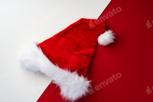Preview: Santa Claus hat on red and white background