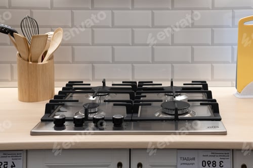 Preview: Modern hob gas stove countertop in big kitchen interior.