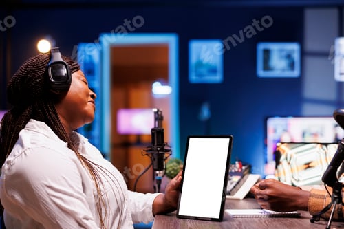 Preview: Woman grasps tablet with chromakey