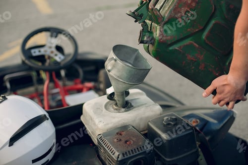 Preview: Handsome man in a karting with a car
