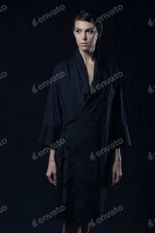 Preview: Fashion photo of young magnificent woman in black shirt