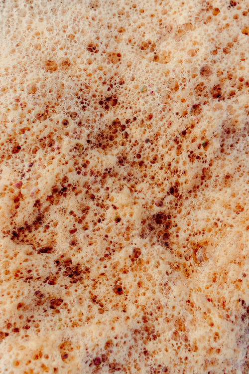 Preview: Closeup of brownish fluffy foam, perfect for wallpapers