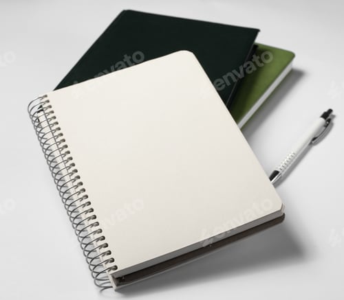 Preview: Notebook And Diaries On A White Background