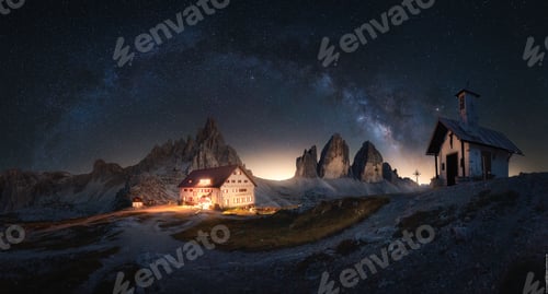 Preview: Beautiful view of a house with Trecime di lavadero under a sky with milky way in Italy