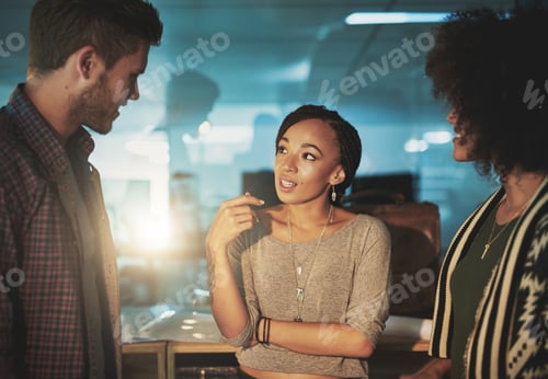 Preview: What did you guys get up to on the weekend. Shot of colleagues talking in a modern office.