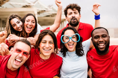 Preview: Multiracial group of spectators watching sports event at stadium