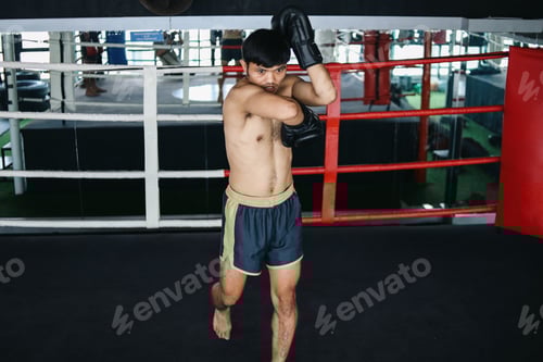 Preview: Muay Thai Man Showing Forward Elbow Strike