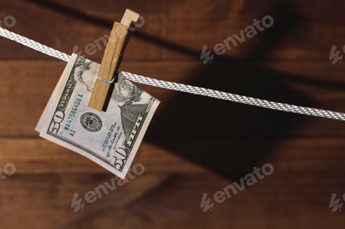 Preview: Fifty Dollar Bill Hanging on a Clothesline