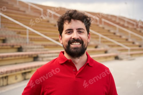 Preview: Outdoor portrait of a Hispanic man looking at the camera smiling