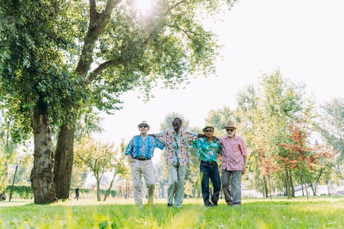 Preview: group of senior friends playing at the park
