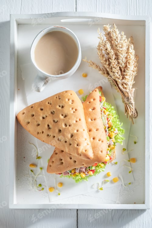 Preview: Fresh sandwich with lettuce, pepper, corn, and ham